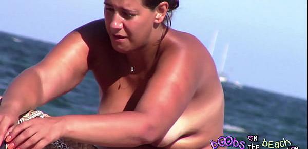  BBW Italian with deep tan topless on the beach with chubby belly